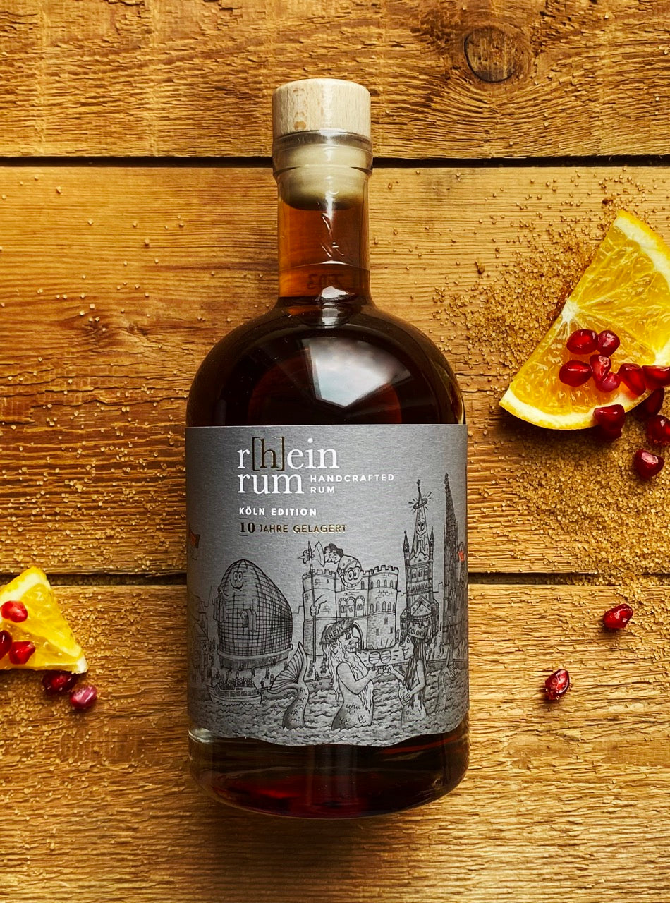 Tilly Köln Rum Vorderseite mit Granatapfel und Orange